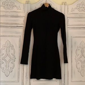 Stretchy black turtleneck mini dress